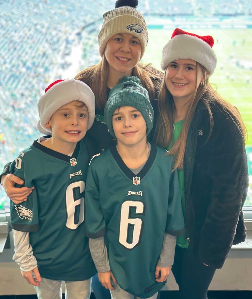 Becky D'Amico and family at recent Eagles' game.