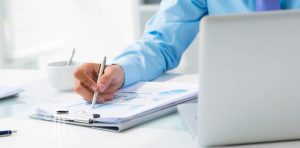 Male preparing tax filings.